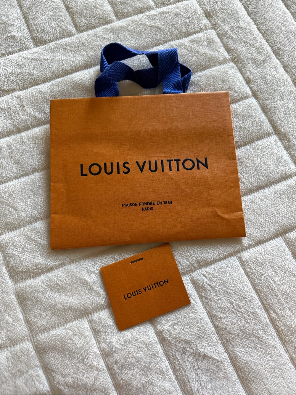 Louis Vuitton Orange Gift Bag with Navy Ribbon Handles and gift tag